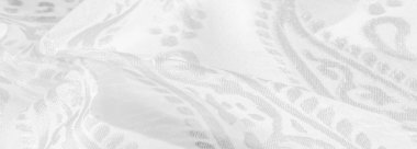 İpek kumaş, kar beyazı kumaş. Beyaz arka planda zarif çiçeklerin gölgeleri, Paisley 'nin fotoğrafı. Doku, desen, koleksiyon