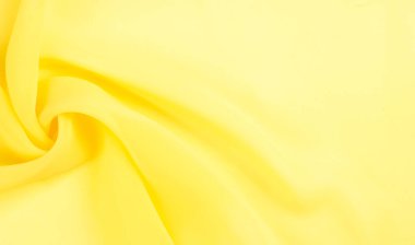arkaplansız doku - sarı ipek. Soluk sarı renkli birinci sınıf ipek organza fevkalade bir kumaştır, hem kendi başına güzeldir hem de vurgu açısından bir aksesuardır..