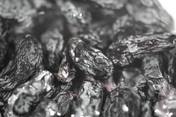 Siyah kuru üzümler en sevdiğiniz yemek ya da yemek tariflerine eklemek için mükemmeldir. Kaliteli üzümlerden elde edilen, uygun lezzet için kurutulmuş güneş. Dünyadaki birçok mutfaktaki vazgeçilmez bir bileşen..