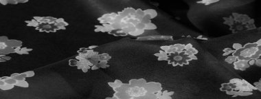 Beyaz desenli yumuşak siyah kumaş, moda veya ev dekorasyonu için yüksek kalite tekstil.