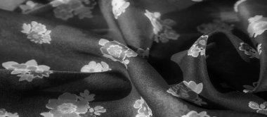 Beyaz çiçekli siyah kumaş, örtülü ve pürüzsüz, moda ya da iç dekorasyon için mükemmel beyaz çiçek desenli kumaş, lüks tekstil, moda için uygun.