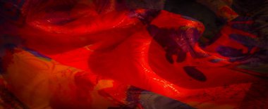 Soyut, turuncu ve mor tonlara sahip canlı kumaş, yumuşak kıvrımlar ve yakın çekimde karmaşık renk geçişleri sergiliyor..