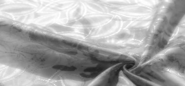 Dokulu bir kumaşın sanatsal siyah-beyaz soyutlaması, doğal kıvrımları ve katmanlı fırça darbelerini vurguluyor, derinlik ve karşıtlık hissi yaratıyor..