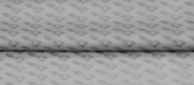 Açık renkli bir kumaşın, tekrar eden siyah üzengiye benzer bir görüntüsü. Dokulu kumaş nazikçe katlanır, dinamik gölgeler ve gölgeler yaratır, tasarımı güçlendirir..