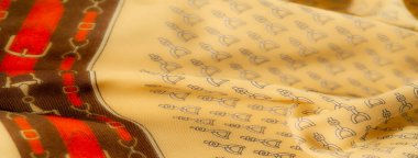 Yumuşak sarı bir kumaş üzengi tasarımlı, buruşuk bir görünüş için doğal olarak buruşmuş. Binicilik modası, ev dekorasyonu ya da tekstil desenleri için mükemmel..