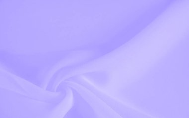 Bulanık, bu hafif lavanta kumaşı yumuşak ve akan örtüsüyle zarif bir görüntü yaratır. Görüntü, yumuşak dalgaları ve kumaşın pürüzsüz ve hassas dokusunu gösteren kıvrımları yakalar..