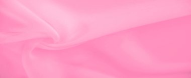 Yumuşak, üst üste binen kıvrımlı soluk pembe kumaş görüntüsü. Yumuşak dokular, soyut arkaplan ya da tasarım projeleri için mükemmel bir akıcı ve dingin desen oluşturur..