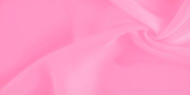 Yumuşak kıvrımları ve ışık dalgaları olan bulanık, pembe bir kumaş, sakin ve rahatlatıcı bir soyut yaratıyor. Hassas dokusu ve açık renkli kumaşı havadar ve nazik gösteriyor..