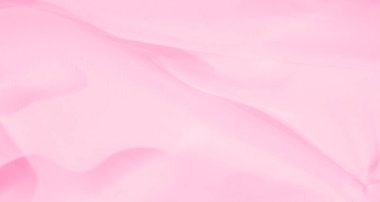 Bulanık pembe kumaş yumuşak kıvrımlar ve kıvrımlarla zarif bir şekilde akar, nazik ve soyut bir tasarım yaratır. Saf malzeme ruhani ve rahatlatıcı bir titreşim veriyor. Zarif projeler için mükemmel..