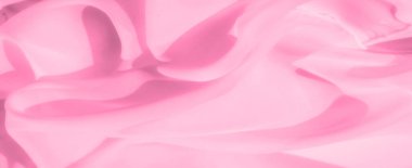 Bulanık pembe kumaş kıvrımları soyut, akıcı bir doku yaratır. Hassas malzeme, dingin ve zarif bir arka plan sunarak ruhani ve romantik atmosferi güçlendirir..