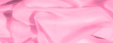 Bulanık pembe kumaş nazikçe katlanarak yumuşak dokular ve şeffaf bir kaplama oluşturuyor. Yumuşak akışı ve hafifliği onu minimalist ve soyut arka planlar için ideal bir seçim yapıyor..