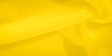 Akan, doğal kıvrımları olan canlı sarı kumaşın bulanık görüntüsü. Doku, kumaş ve tasarım sunumları için taze ve basit bir estetik sunarak dinamik ışık ve gölge efektleri yaratır..