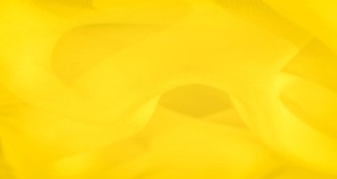 Yumuşak, akıcı bir dokusu ve ince kıvrımları olan bulanık sarı kumaş. Parlak sarı renk kumaşın ışık yansımasını vurguluyor, ona sıcak ve soyut bir kompozisyon veriyor..