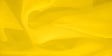 İnce, kıvrımlı kıvrımlı, bulanık sarı kumaş soyut bir kompozisyon oluşturuyor. Yumuşak ve akışkan dokusu, kumaşın yumuşaklığını vurgular ve onu görsel olarak sakinleştirir..