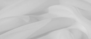 Bulanık, yumuşak, beyaz kumaş pürüzsüz dalgalar halinde zarifçe örterek, sakin ve narin bir doku oluşturur. Işığın etkileşimi ve ince kıvrımlar minimum ve sofistike görünümü geliştirir..