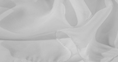 İnce dalgalarla bulanık beyaz kumaş, soyut, minimalist bir his yaratıyor. Hassas kıvrımlar ve nazik akış onu dingin ve modern görsel kompozisyonlar için mükemmel bir seçim yapıyor..