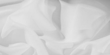 Yumuşak, akışkan kıvrımlı beyaz kumaşın bulanık görüntüsü ışık ve hava malzemesinin özünü yakalıyor. Pürüzsüz yüzey minimalist, zarif, temiz ve sakin tasarımlar için mükemmel..