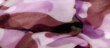 Soyut pembe ve kahverengi kumaş deseninin bulanıklığı, ince hareketi ve hassas akışı yakalıyor. İç tasarım ya da yaratıcı projeler için ideal, yumuşak ve rahatlatıcı estetik.