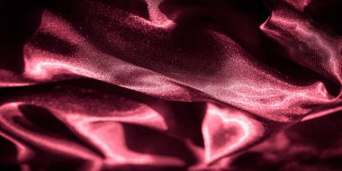 Koyu kırmızı saten kumaş bulanıklığı pürüzsüz dokusunu ve parlak parıltısını gösteriyor. İnce kıvrımlar ve hafif oyunlar sofistike ve zarif bir görsel efekt yaratır. Üst düzey moda için mükemmeldir..