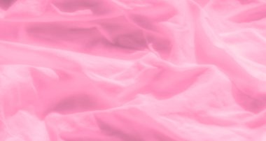 Yumuşak, akışkan kıvrımları ve yumuşak gölgeleri olan pembe kumaş bulanıklığı. Minimalist doku sakin ve zarif bir atmosfer sağlar, sakin kompozisyonlar için mükemmeldir..