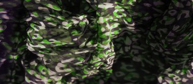 Saf kumaş bulanıklığı, yeşil, siyah ve beyaz soyut desenlerin canlı bir karışımı. Akan malzeme, modern ve modaya uygun tekstil tasarımını geliştirerek boyut ve derinlik ekler..