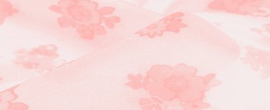 Bu kumaşın pürüzsüz dokusu ve yumuşak pembe çiçek deseni, sakin ve romantik bir atmosfer yaratmak için güzel bir şekilde birlikte çalışıyor. Şeffaf madde çiçekleri vurguluyor.