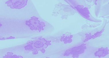 Lavanta çiçekli desenlerle süslenmiş akan pastel kumaş bulanıklığı. Yumuşak kumaşlar zarif bir şekilde örtülmüş, çiçek desenleri zarif ama büyüleyici bir tasarım yaratmış, dingin bir estetik için mükemmel.