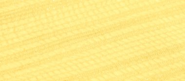 Pürüzsüz bir dokusu ve yumuşak kıvrımları olan parlak sarı kumaş. Işık maddedeki nazik dalgaları güçlendirir, ona ışıltılı, lüks bir etki ve zarif bir parıltı verir..