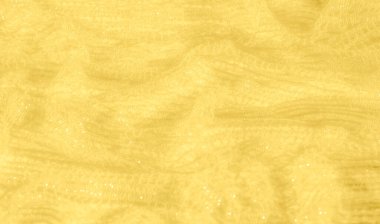 Karmaşık parıldayan desenleri olan soluk sarı bir kumaş. Narin dokuma ve yumuşak kıvrımlar ışıl ışıl, dokulu bir yüzey oluşturuyor. Bu da biraz sıcaklık ve zarafet katıyor..