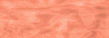 Bulanık şeftali dantelli kumaş, ince detaylar ve zarif bir yapı. Yumuşak dokular ve karmaşık dokuma desenleri ışık yansımalarıyla aydınlatılır, parlak ve narin bir görünüm yaratır.