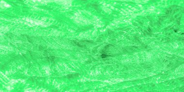 Yumuşak yeşil dantelli kumaş bulanıklığı akışkan bir hareketle düzenlenir ve dantel işçiliğinin ince dokusunu ortaya çıkaran parlayan ışıkla güçlendirilir. Büyüleyici ve dinamik bir görüntü..