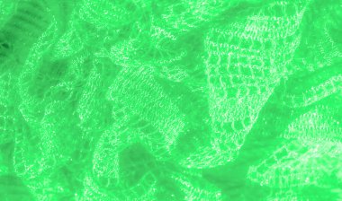 Narin, ışık yansıtan dokuları olan yeşil dantel kumaştan bir bulanıklık. Karmaşık dokuma desenleri ışık altında parlayan yumuşak kıvrımlar yaratarak lüks bir his yaratıyor..