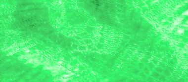 Dalgalı yeşil dantel kumaşlı, narin dokuma desenli bulanık. Yumuşak kıvrımlar ışık altında parıldıyor, zarif ve karmaşık bir görsel cazibe sunuyor..