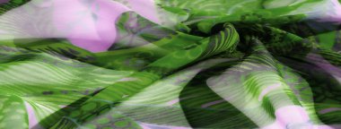 Yıkanmış yeşil ve lavanta çiçekli kumaş. Üzerinde akıcı ve şeffaf bir doku, karmaşık yapraklar ve soyut şekiller var. Yeşil, yumuşak lavanta ile çok güzel zıtlaşıyor.,