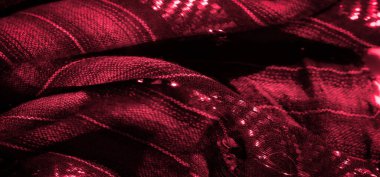 Parlak dokuları ve kalın desenleri olan zengin detaylı kırmızı kumaş bulanıklığı. Pürüzsüz kıvrımlar ve dinamik ışıklandırma, üst düzey tekstil ve moda tasarım projeleri için ideal olan görsel cazibeyi artırıyor.