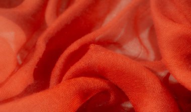 İnce ışık yansımaları ve ince kıvrımlı kırmızı kumaşın bulanık görüntüsü. Yumuşak dokusu ve şeffaf kalitesi güzel ve hafif bir hava yaratıyor.,