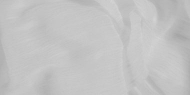 Yumuşak, beyaz kumaştan ince kıvrımlı ve ince bir dokusu var. Nazik dalgalanmalar soyut bir şablon oluşturur. Bu da onu arka plan ya da görsel öğeler için mükemmel kılar..