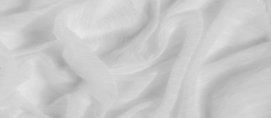 Bulanık kumaş yumuşak dalgalanmaları ve ince desenleri tek renkli bir tonda gösteriyor. İnce dokular ve doğal kıvrımlar minimalist ve rahatlatıcı bir görsel cazibe yaratır..