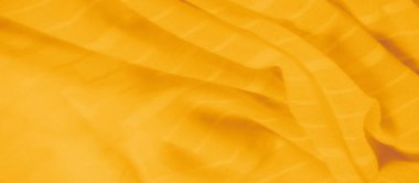 Görüntü. Zarif çizgileri olan yumuşak ve canlı sarı kumaş, sıcak ve davetkar bir doku yaratıyor. Hafif ve havadar görünüm, arka plan veya soyut tasarım konc için mükemmel
