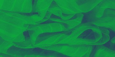 Hassas yeşil kumaştan bulanık, yumuşak gölgeli ve pürüzsüz çizgilerle örtülü. Kumaşın nazik kıvrımı rahatlatıcı ve doğal bir soyut etki yaratır..