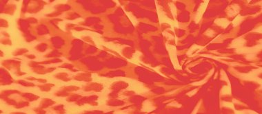 Bulanık dinamik kumaş, leopardan esinlenilmiş turuncu ve sarı renkli. Yumuşak kıvrımlar kumaşa dokunsal, akışkan bir görünüm verirken, kalın desen hareket yaratır..