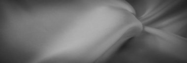 Bu gri pullu kumaşın nazik dalgalarını bulanıklaştırır. Yumuşak desenler, ipeksi dokusunu ortaya çıkarır. Işık ve gölgenin etkileşimi pürüzsüz kıvrımlara derinlik ve boyut ekler..