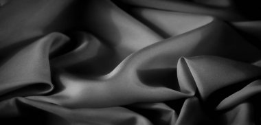 Bu gri pullu kumaşın yumuşak ve narin kıvrımlarını bulanıklaştır, ince gölgeleme ve pürüzsüz akış zarif bir doku yaratır. Arkaplan veya tekstil tasarım projeleri için ideal