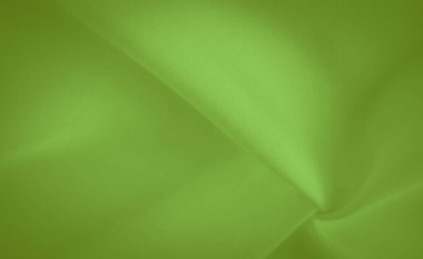 Canlı, neon yeşil kumaşlı, ince kıvrımlı bir bulanıklık. Kumaş ışığı sorunsuzca yansıtıyor, parlak dokusunu geliştiriyor ve maddeye parlak, lüks bir cazibe veriyor..