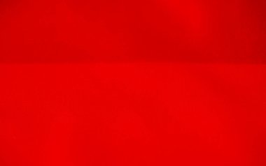 Yumuşak kıvrımları ve pürüzsüz dokusu olan kırmızı kumaş bulanıklığı, canlı renk ve akış kıvrımları, zarif ve birinci sınıf tasarımlar için ideal materyalin lüks doğasını vurgular..