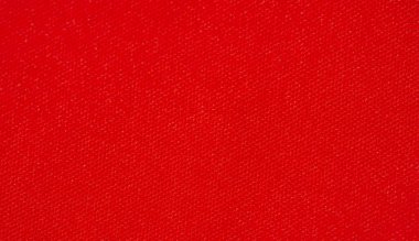 Pürüzsüz, yumuşak kıvrımlı ve hafif parıltılı parlak kırmızı kumaş. Koyu kırmızı renk, üst düzey moda veya tasarım projeleri için ideal materyalin lüks ve zarif doğasını vurgular..