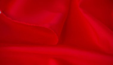 Yumuşak kıvrımlı kırmızı Görüntü Kumaşı zengin ve dinamik bir doku sunuyor. Rengi pürüzsüz yüzeyle çok güzel zıt. Zarif ve modern bir görsel cazibe yaratıyor..
