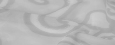 Hafif girdap desenleri ve yumuşak dokusu olan bulanık bir kumaş. Yumuşak kıvrımlar derinlik ve hareket katlar, kumaşa hava gibi, ağırlıksız bir his verir, modern iç mekanlar için ideal..