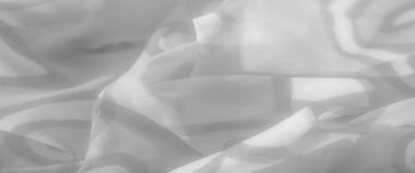 Soyut kıvrımlar ve kıvrımlar içeren yumuşak, dalgalı beyaz kumaşı bulanıklaştır. İnce kıvrımlar ve nazik şablonlar, ince tekstil için mükemmel, hafif bir doku yaratıyor.