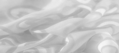 Hassas, girdap gibi dizaynlı beyaz kumaşı bulanıklaştır. Yumuşak, pürüzsüz kumaş zarif bir şekilde akıyor. Modern ve minimalist dekorları geliştiren ince ve sofistike bir görünüm yakalıyor..